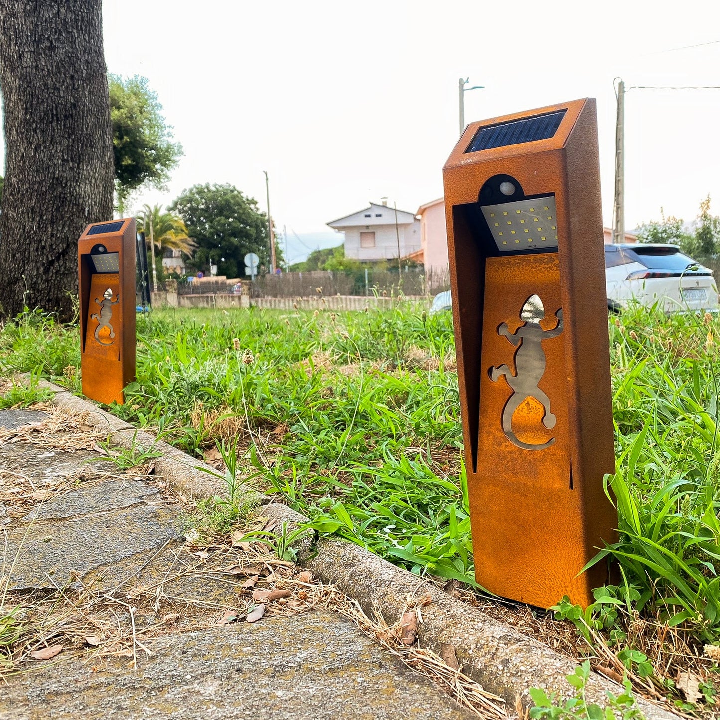 Natural rust Corten solar garden light. Outdoor bollard or beacon with motion sensor. Wireless. Warm white light.