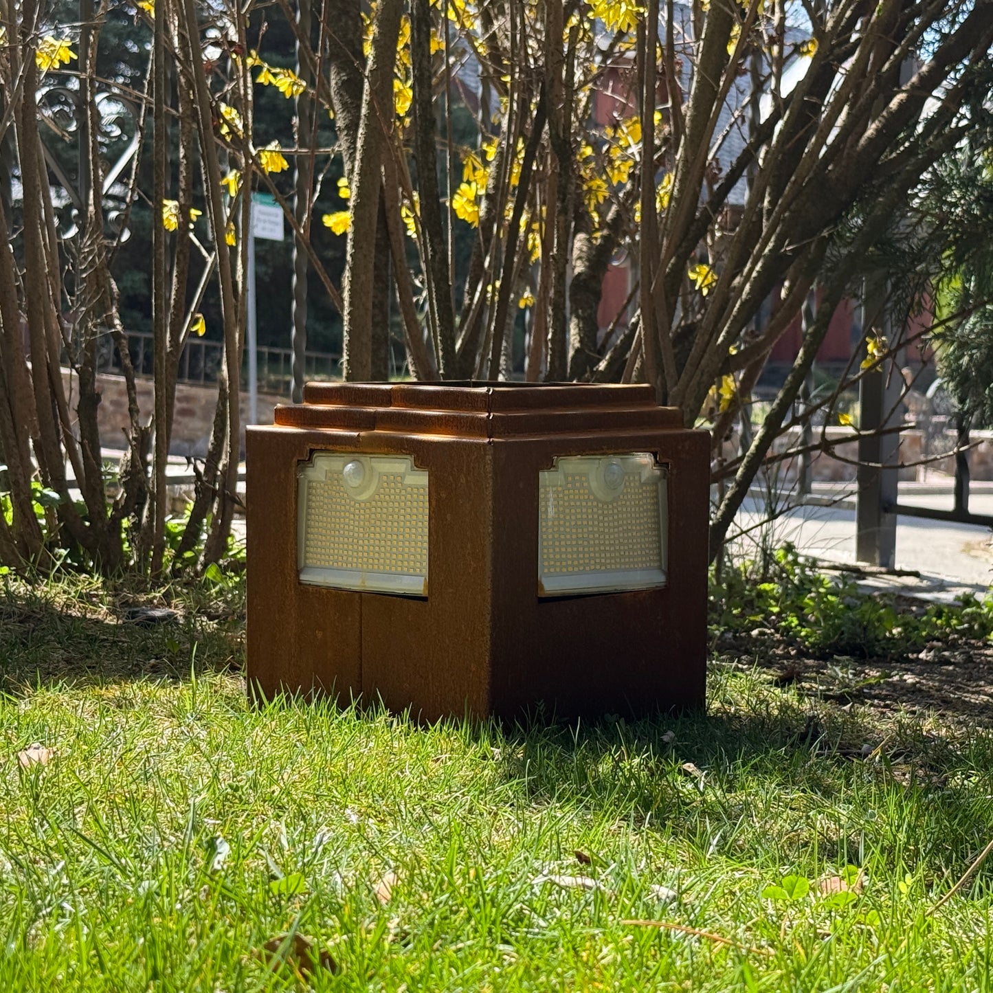 Natural rust Corten solar garden light. Powerful outdoor bollard or beacon with motion sensor. Wireless. Warm white light.